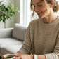 Ecoband 5.0 in White & Pink — worn at a breakfast table (white & pink)