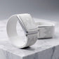 Ecoband 5.0 Mandala Edition — brushed silver clasp detail on white Italian bio-leather, marble plinth (silver)