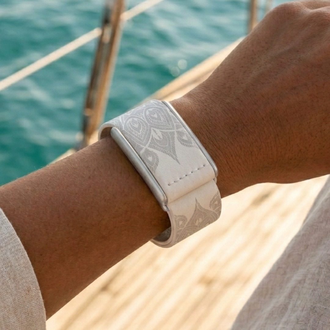 Ecoband 5.0 Mandala Edition — WHOOP-compatible band with brushed silver clasp worn on the wrist (silver)