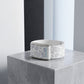 Ecoband 5.0 Tropicale — laser-engraved botanical pattern on white bio-leather with a polished silver clasp