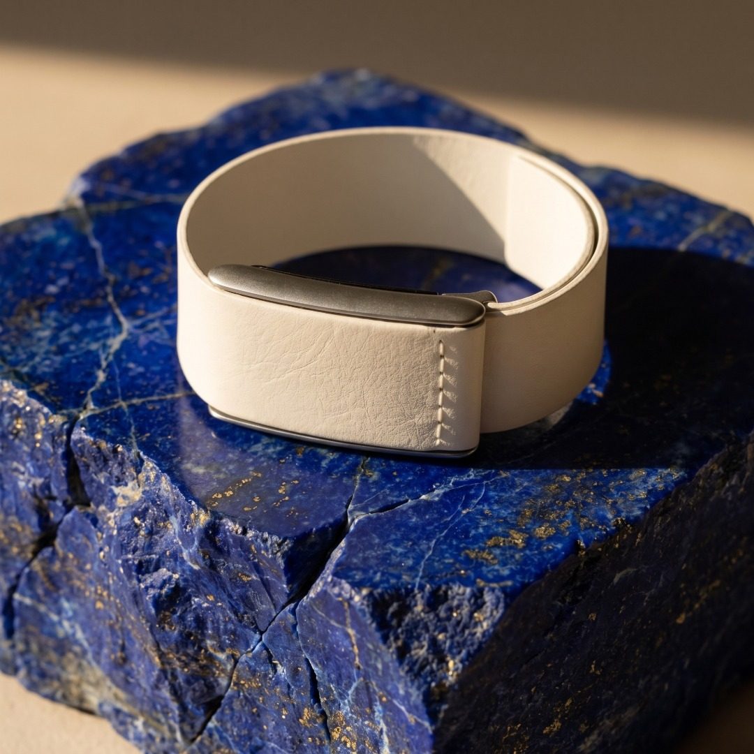 Ecoband 5.0 in Bianco — white bio-leather WHOOP band on lapis lazuli stone (Bianco)
